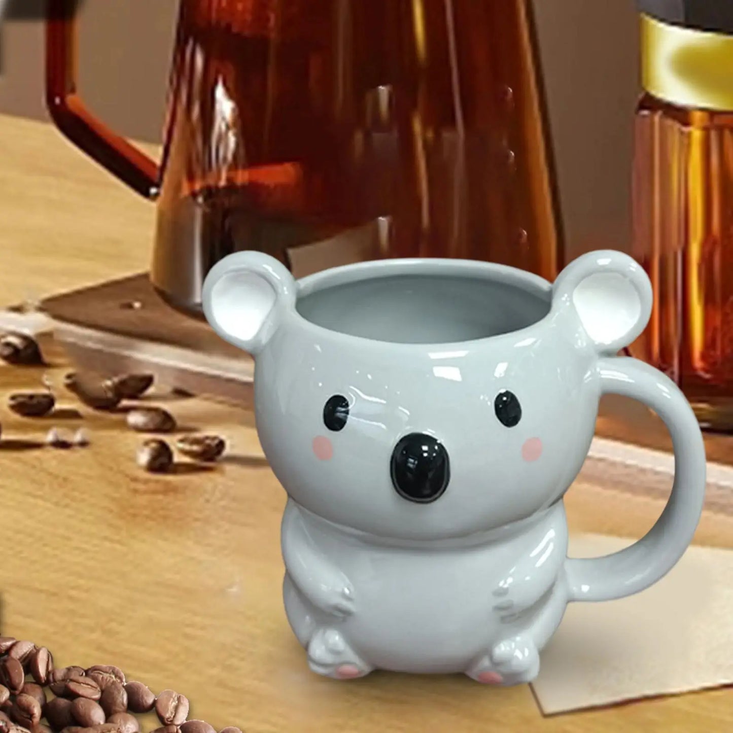 Ceramic animal bear mug in use for morning coffee